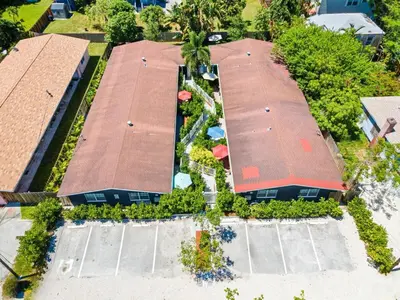 an overhead view of a building with a roof at Lovely 2 BR condo with free parking on premises in Fort Lauderdale