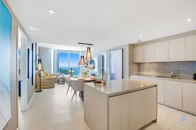a kitchen with a dining room and a living room at Oceanfront Oasis, Luxury, Sunrise Views, Resort in Hollywood