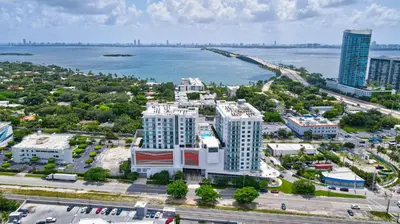 an aerial view of a city with a body of water at 3900-719JC DESIGN DISTRICT, CONDO 1 BEDROOM /1 BATHROOM & BAYVIE in Miami
