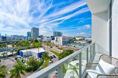 a balcony with a view of the city at 3900-504MQ DESIGN DISTRICT, CONDO 1 BEDROOM & 1 BATHROOM in Miami