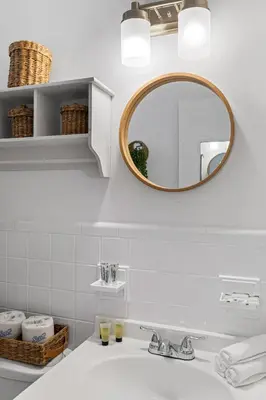 a bathroom with a sink and a mirror at The Perfect Escape @Lake Ridge in Fort Lauderdale