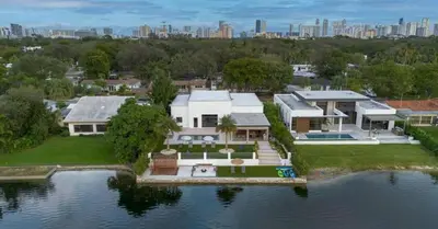 an aerial view of a house on the water at Waterfront Mansion The GlamHomes in North Miami Beach