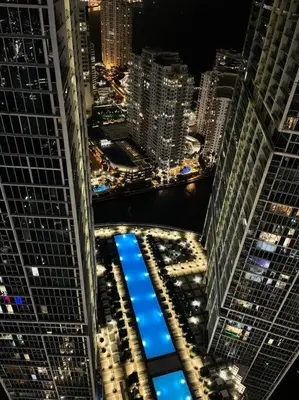 an aerial view of a city at night at Water & Pool Views, One bedroom W hotel building in Miami