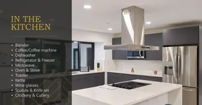 a kitchen with a refrigerator and a white counter top at Luxurious Villa with Elegant Interior and Mini Golf TGH in Hollywood