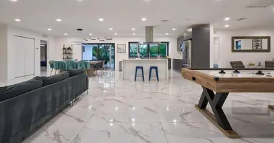 a living room with a ping pong table in it at Luxurious Villa with Elegant Interior and Mini Golf TGH in Hollywood