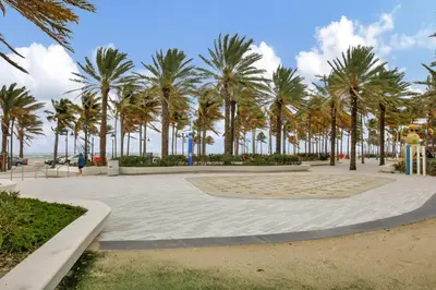 a park with palm trees on the beach at Studio Right off Las Olas - Steps to FTL Beach 1C in Fort Lauderdale