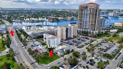an aerial view of a city with buildings and a street at 2 Condo Combo Walk to Beach Off Las Olas 2AB in Fort Lauderdale