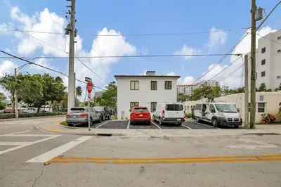 a group of cars parked in a parking lot at Studio Right off Las Olas - Steps to FTL Beach 1B in Fort Lauderdale