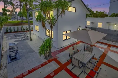 an overhead view of a patio with a table and an umbrella at Lux Villa 3br 2ba off Las Olas in Fort Lauderdale