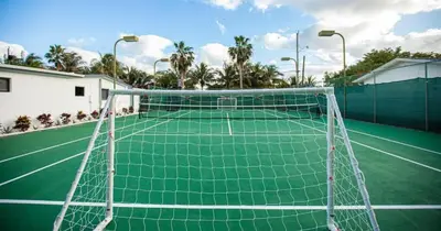 a tennis net on a tennis court at Luxurious Retreat with Tennis and Soccer Courts TGH in Miami