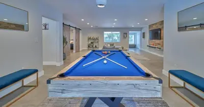 a large blue pool table in a room at Villa Athena - The Glamhomes in Miami