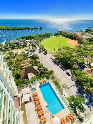 an aerial view of a resort with a swimming pool and the ocean at Balcony Ocean View ! Pool - WiFi - Gym - Parking in Miami