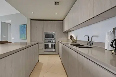 a large kitchen with stainless steel appliances at Luxury 2BR 2BA Water Front in Hyde Beach Resort in Hollywood