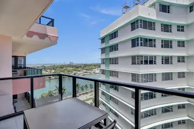 a balcony with a view of a building at 2BR 2BA condo with beach service 1616 in Miami Beach