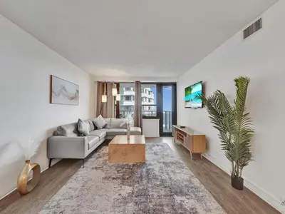 a living room with a couch and a table at Ocean View Beach Retreat Beach Service 606 in Miami Beach
