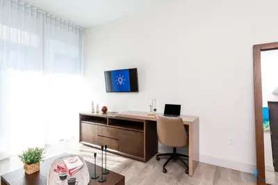 an office with a desk and a chair at Best Stay Rooftop Pool Hollywood Beach Boardwalk in Hollywood