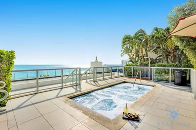 a hot tub on a balcony overlooking the ocean at Front Bay View, Enjoy Sunsets, Amazing Pool in Hollywood