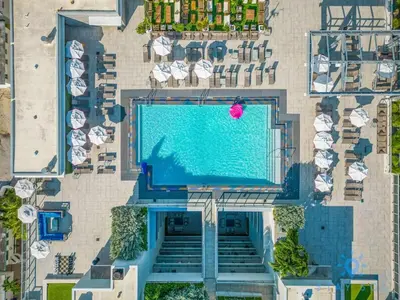 an overhead view of a swimming pool in a resort at Worth Traveling Hot tub & Unique Rooftop pool in Hollywood