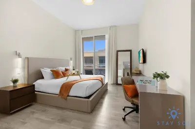 a bedroom with a bed and a desk and a desk at Hot tub & Unique Rooftop-Hollywood Broad-walk in Hollywood