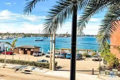 a view of a harbor with cars parked in a parking lot at Condo Bay View Infinity Pool Beach Service in Hollywood