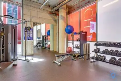 a room with a gym with a lot of equipment at Condo Bay View Infinity Pool Beach Service in Hollywood