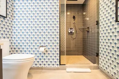 a bathroom with a toilet and a shower at Boutique Condo in DT Miami Perfect for Couples/Fam in Miami
