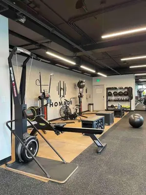 a room with a gym with a treadmill and weights at Boutique Condo in DT Miami Perfect for Couples/Fam in Miami