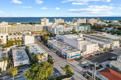 an aerial view of a city with buildings and the ocean at Comfy 1 B/R, Near Ocean Dr & Beach - South Beach in Miami Beach