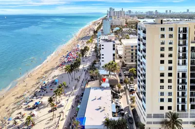 an aerial view of a beach and buildings and the ocean at Beach Condo 2BR & Efficiency Combo on Hollywood Beach in Hollywood