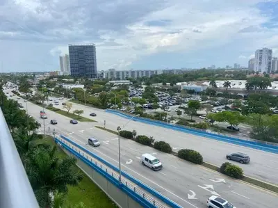 a view of a highway with cars on the freeway at Sunny Mornings & 2 Full Beds, BeachWalk Studio in Hallandale Beach