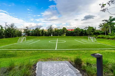 a soccer field with two soccer goals on it at Sleek Doral Retreat 1 Bed Oasis With Free Parking in Hialeah Gardens