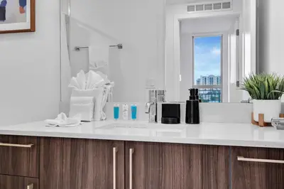 a kitchen counter with a sink and a window at Charming 3-Bed Mins from Brickell With Free Parking in Miami