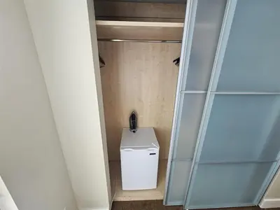 a bathroom with a washer and dryer in a room at Mare-1708 B in Aventura