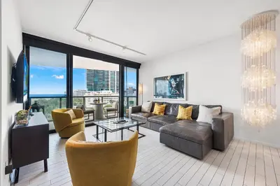 a living room with a couch and a table at Oceanview Private Home at South Beach-814 in Miami Beach