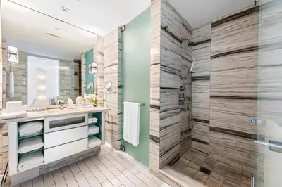 a bathroom with a shower and a sink at Oceanview Private Home at South Beach-814 in Miami Beach