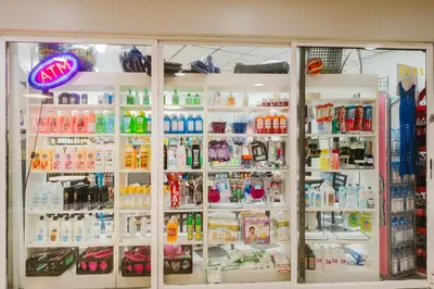 a refrigerator filled with lots of different types of drinks at Miami Beach Oceanfront in Miami Beach