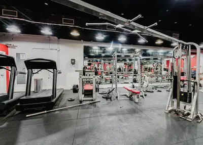 a gym with lots of equipment in a room at Miami Beach Oceanfront in Miami Beach