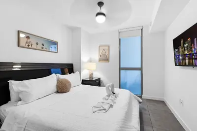 a bedroom with a white bed and a window at Prime Location 1-Bed Retreat With Free Parking in Miami
