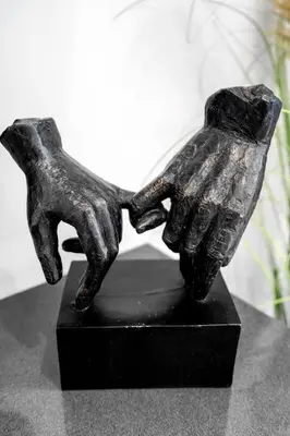 a bronze statue of a dog holding its leash at Prime Location 1-Bed Retreat With Free Parking in Miami