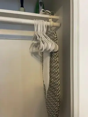 a pair of ties are hanging in a refrigerator at Private Studio Near Guitar Casino & Stadium in Carver Ranches