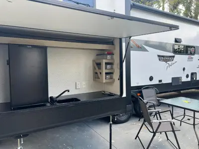 a food truck with a sink and a table at Free BBQ in RV With Private entrance in Homestead