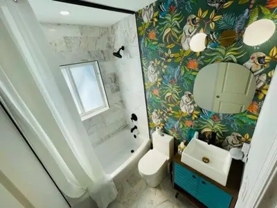 a bathroom with a toilet and a sink and a shower at Stylish Room close to everything in Miami in Miami Shores