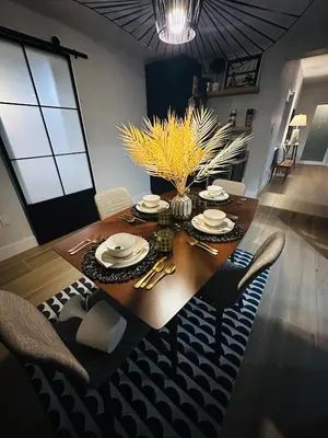 a dining room table with chairs and a dining roomiasm at Stylish Room close to everything in Miami in Miami Shores