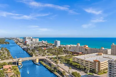 an aerial view of a city with a bridge and the ocean at Executive Studio Suite Hollywood Beach Blvd in Hollywood