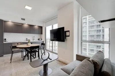 a living room with a couch and a table at 1912AA DOWNTOWN MIAMI STUDIO in Miami