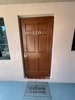 a door with the words welcome to our home at Apartment in Hollywood close to shops & beach 110 in Hollywood