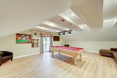 a living room with a pool table in it at Tropical Oasis 6BR & 4BR Villa Heated Pool & Billiard Room in Hollywood