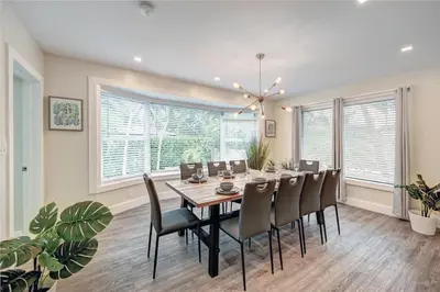 a dining room with a table and chairs at Luxury Villa WALK 5 minutes to Hollywood Beach in Hollywood
