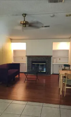 a living room with a couch and a fireplace at 1233 Apartment 1 Miami in Tamiami