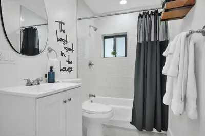 a bathroom with a sink and a toilet and a mirror at Suite Azul Miami - Private Guest Suite with Patio, Free Parking, Near Wynwood and Beaches in Miami